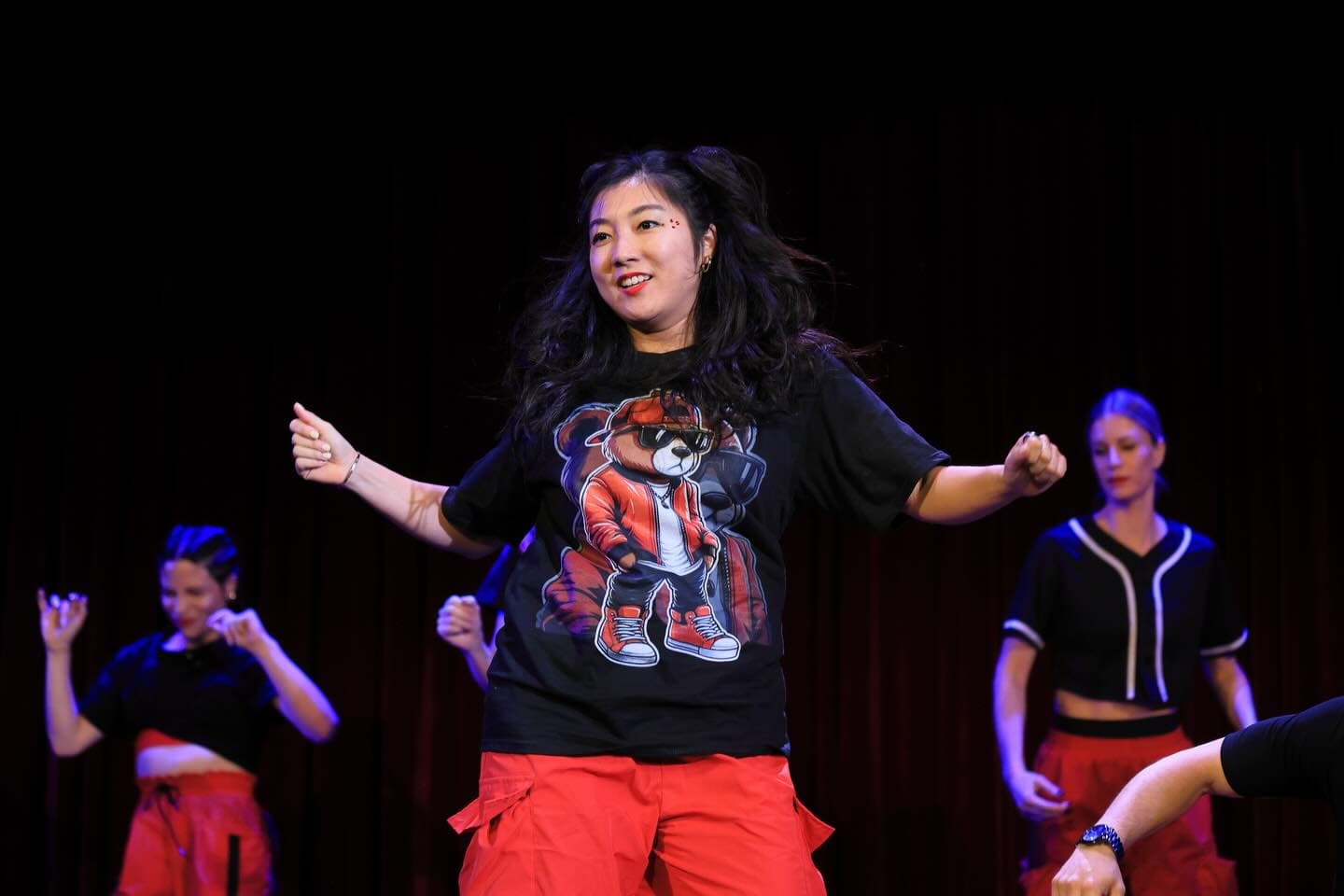 Ting Ting performing dance on stage